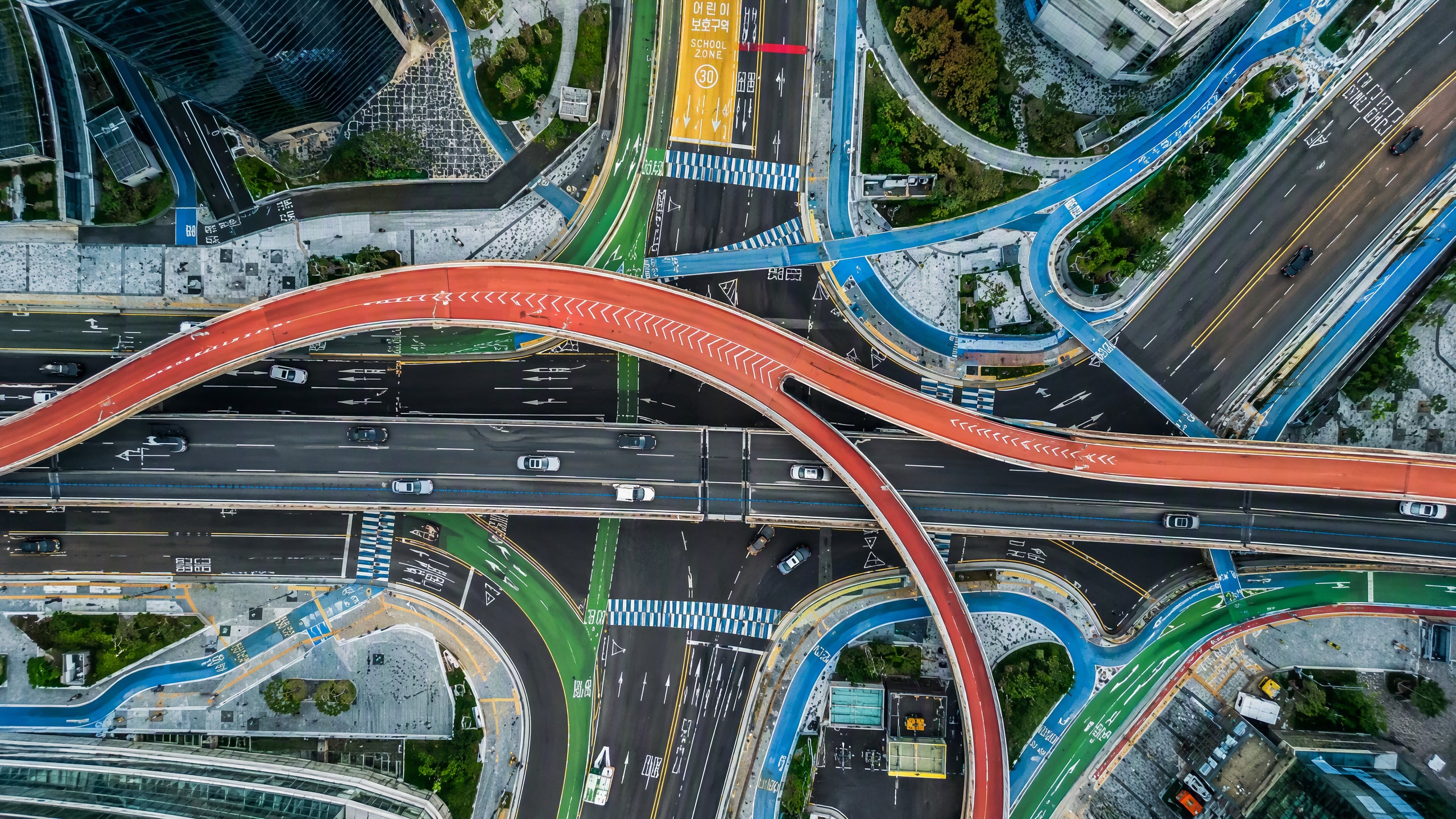 Colored road surfacing application